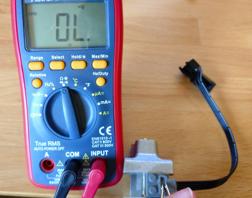 The fixed contact is glued into the coupler