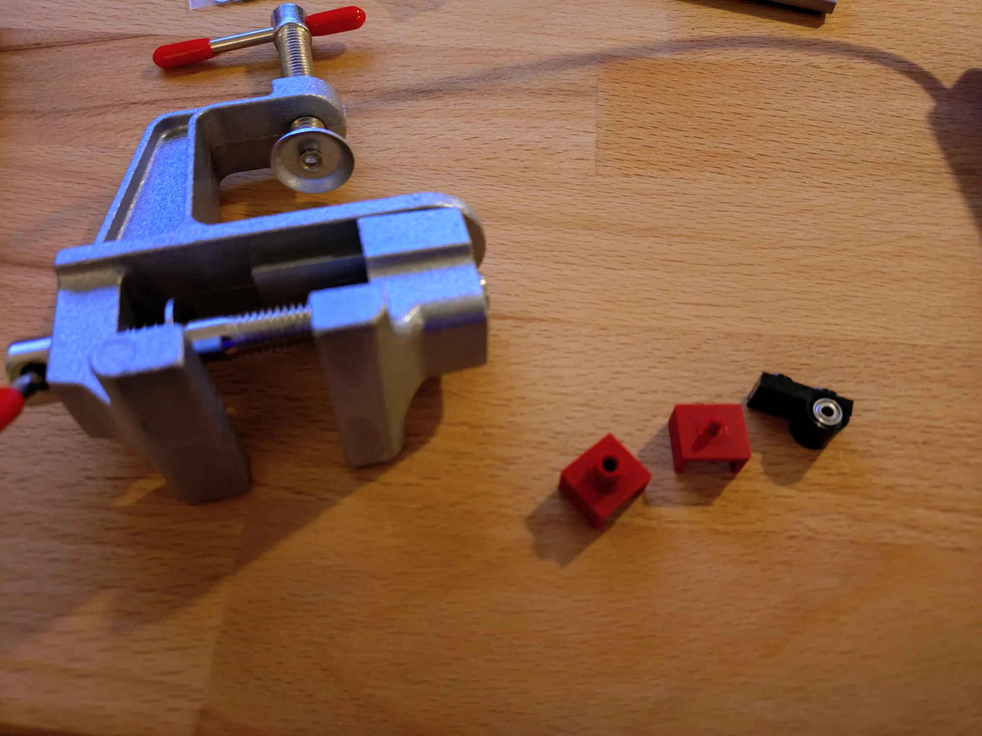 Tools for pressing ball bearings into Lego technic pieces